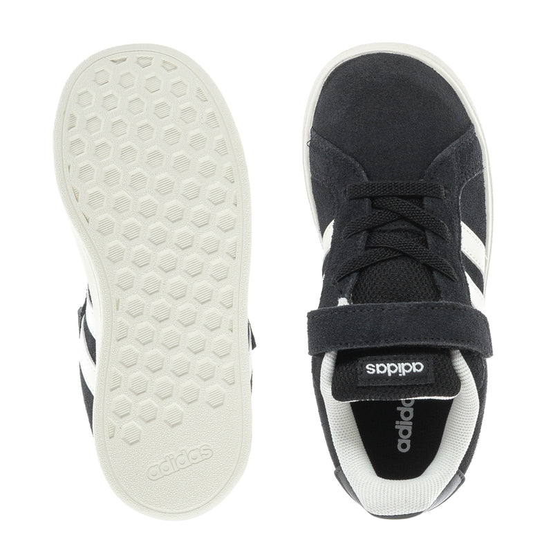 Black toddler sneakers outsole and toe view, white rubber traction sole