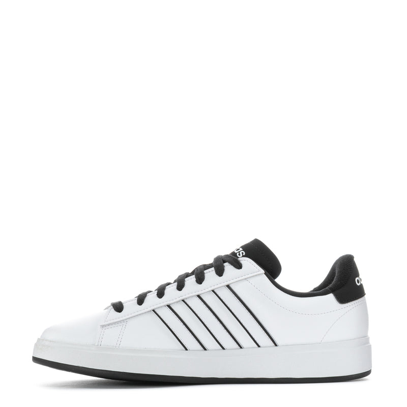 Men's low-top white sneakers with black stripes, black collar, and lace-up closure