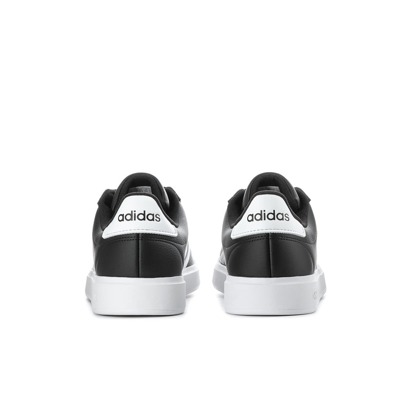 Men's adidas sneakers heel view in black with white sole and logo