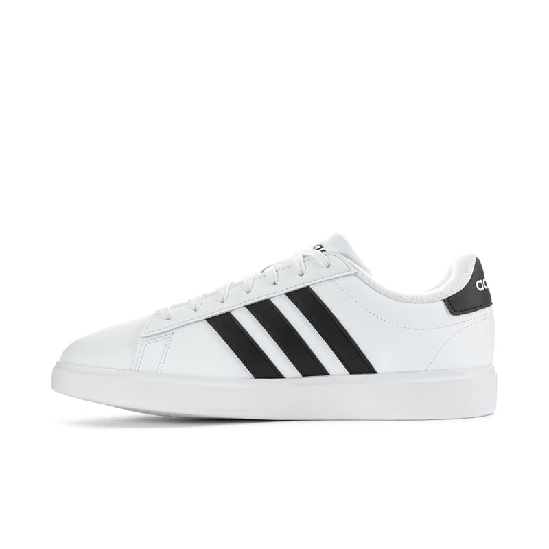 Men's white leather low-top sneakers with black three-bar stripes