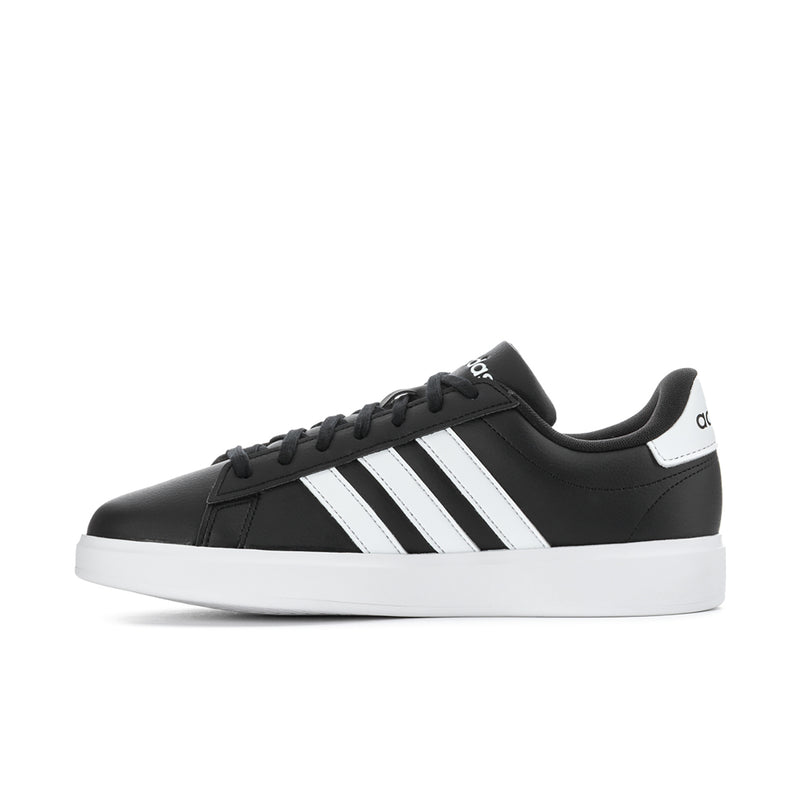 Men's black adidas low-top sneaker with three white stripes and lace-up