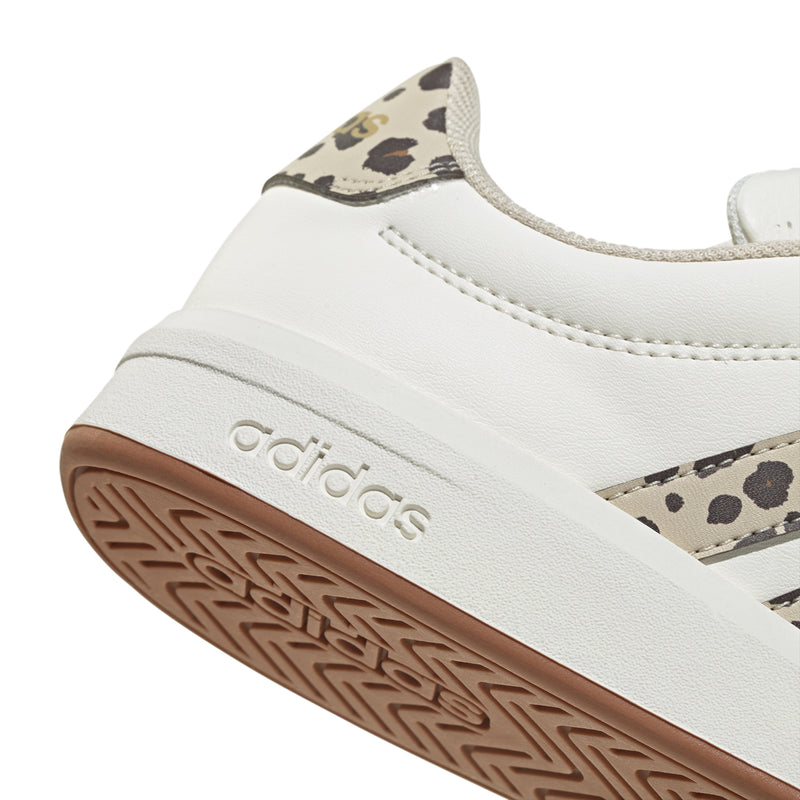 Youth white sneaker heel with adidas logo, leopard collar detail, tan gum sole.