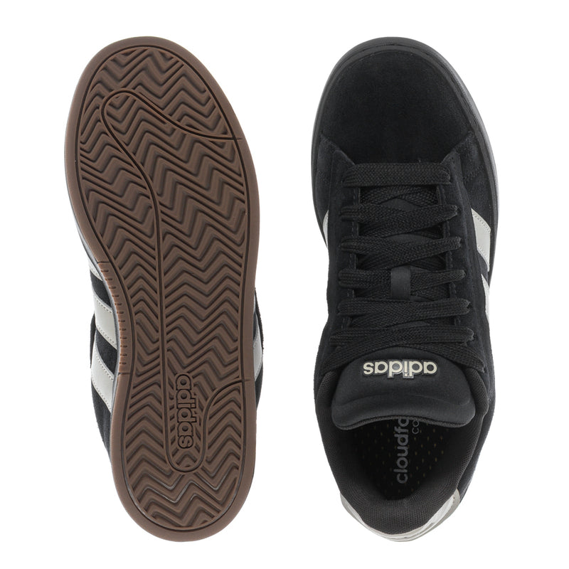Men’s black adidas sneaker with black laces, white heel tab, and gum outsole