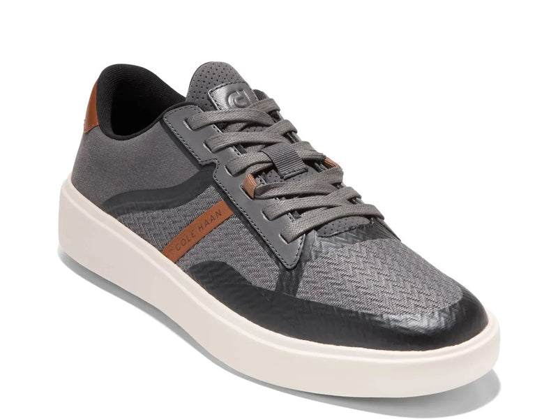 Quarter turn view Men's Cole Haan Footwear style name Grand Crosscourt Winner in color Magnet/ British Tan/ Ivory. Sku: C40457