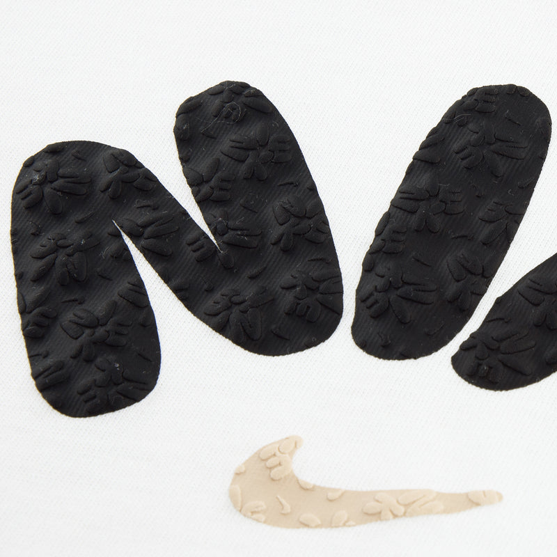 Textured grip pads for kids scooter set, black with embossed pattern and a beige pad