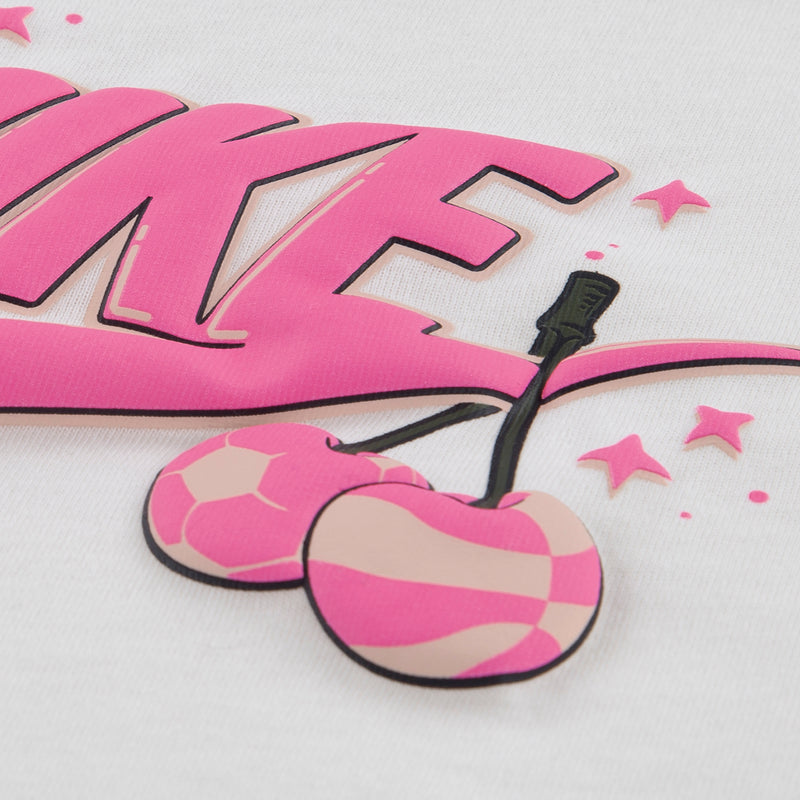 Close-up of pink scooter graphic and star accents on a white kids t-shirt