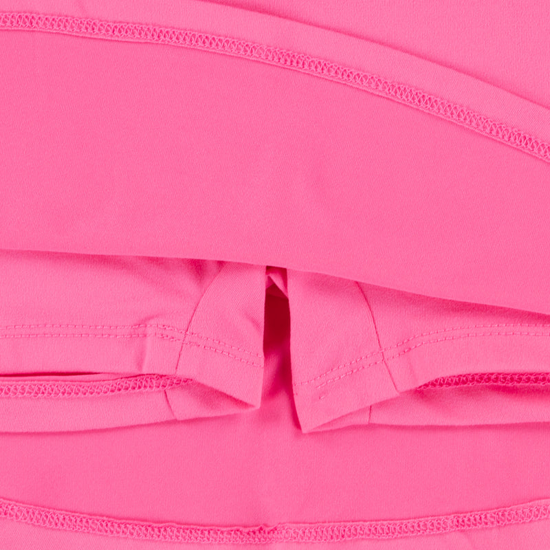 Pink skirt waistband and stitched hem seam close-up