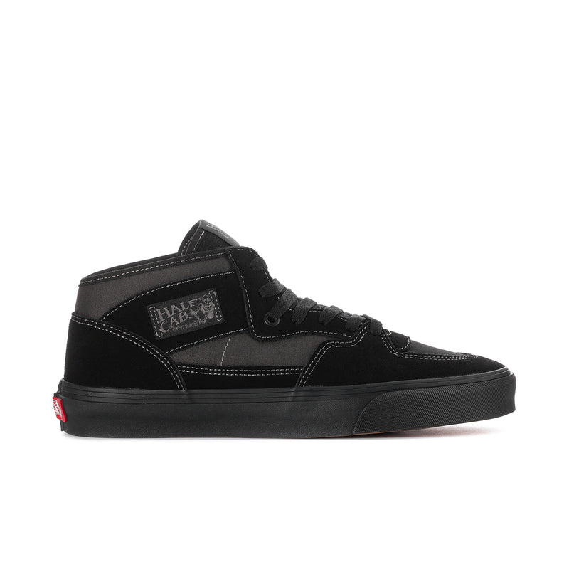 Men's black high-top sneakers with lace-up, padded collar, and side stripe stitching
