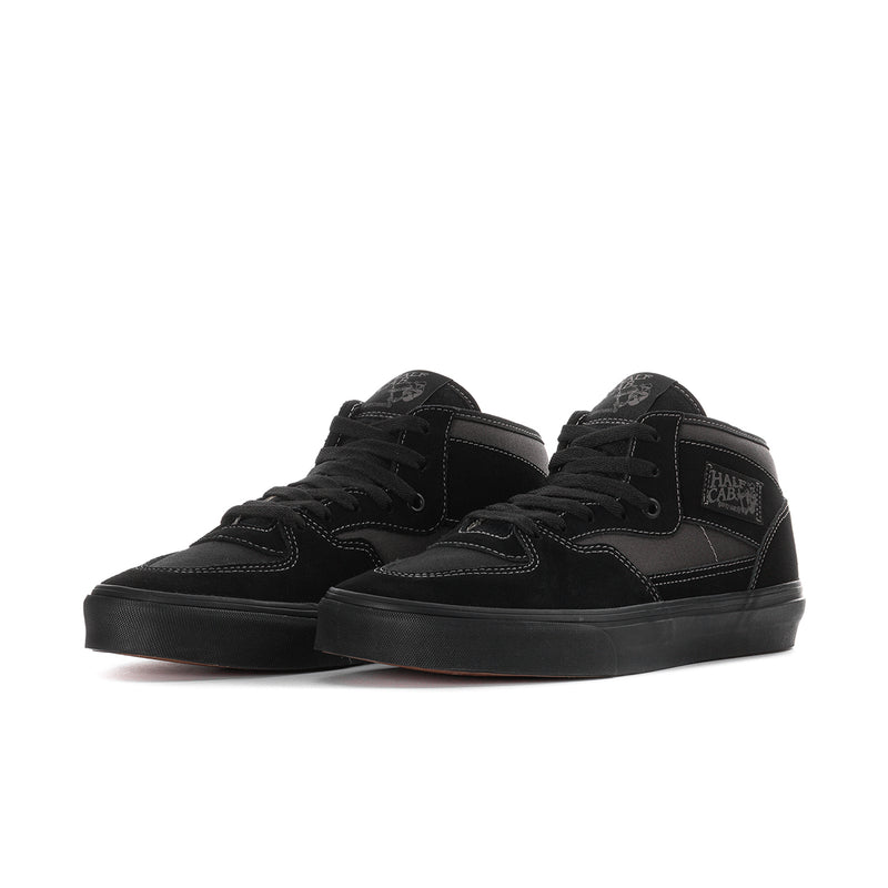 Pair of men's black high-top sneakers with lace-up front and black rubber sole