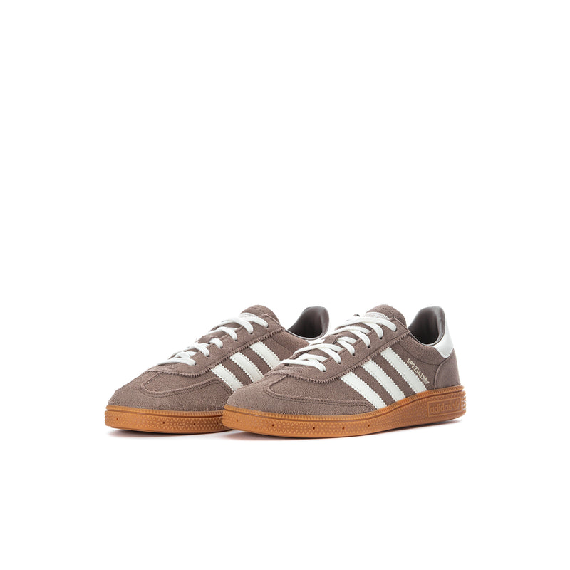 Kids retro sneakers, side view with white adidas-style stripes and gum sole