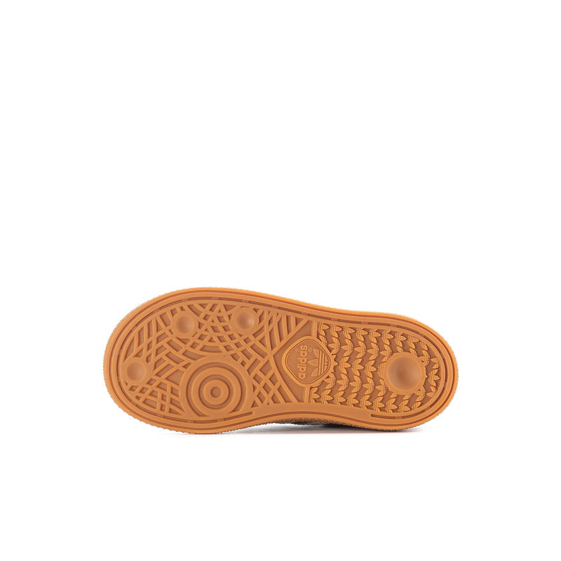 Gum rubber outsole tread with adidas logo on toddler sneakers