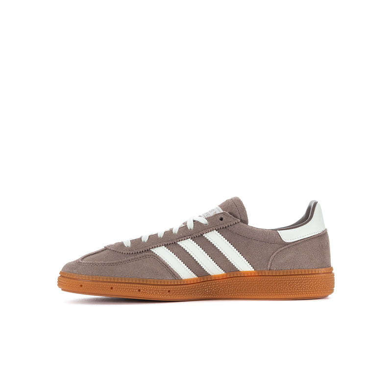 Youth suede sneakers, brown with cream stripes, orange gum outsole and lace-up front.