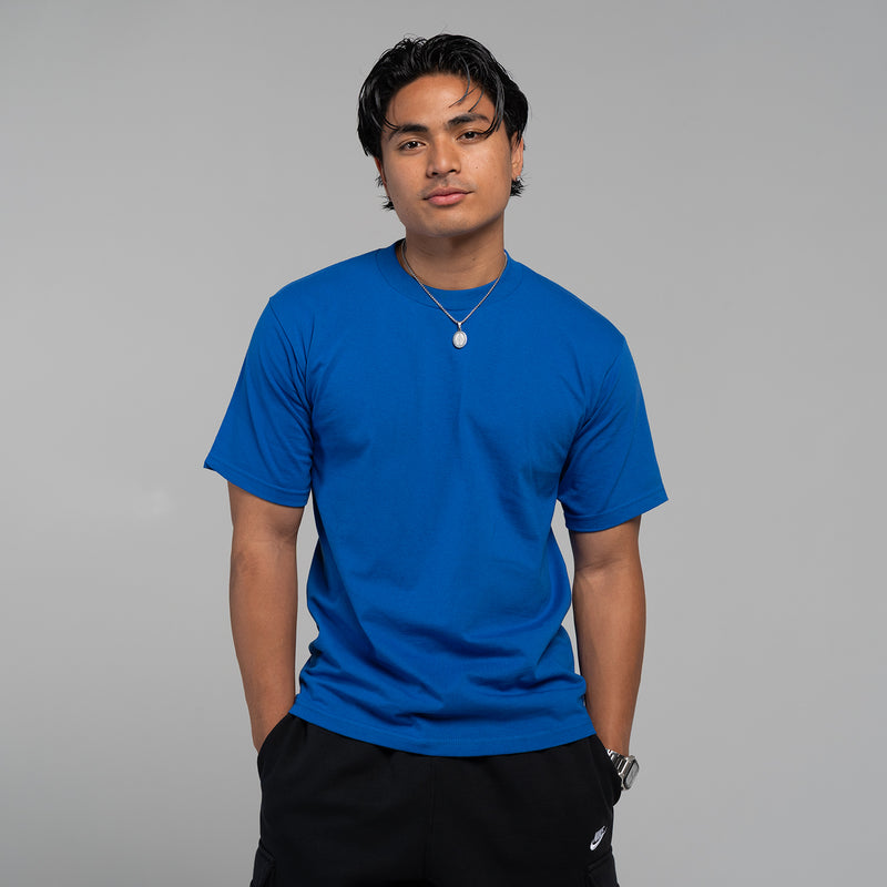 Men's royal blue crew neck T-shirt on model, short sleeves