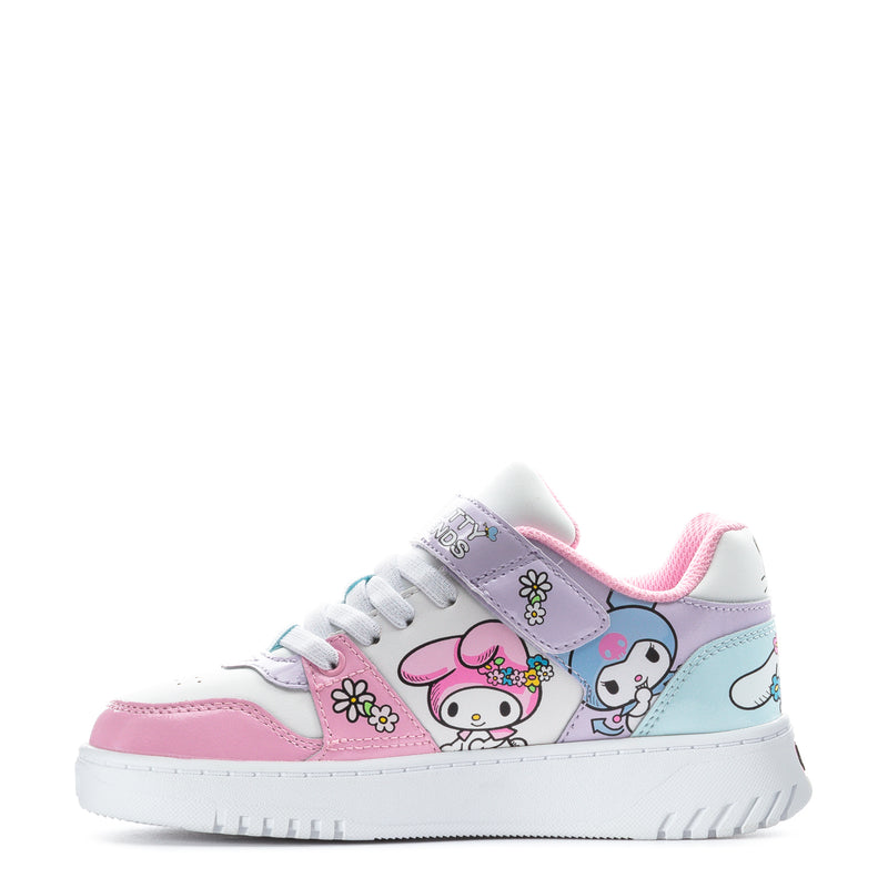 Kids low-top sneakers with pink and white upper, light blue accents, and cartoon patches