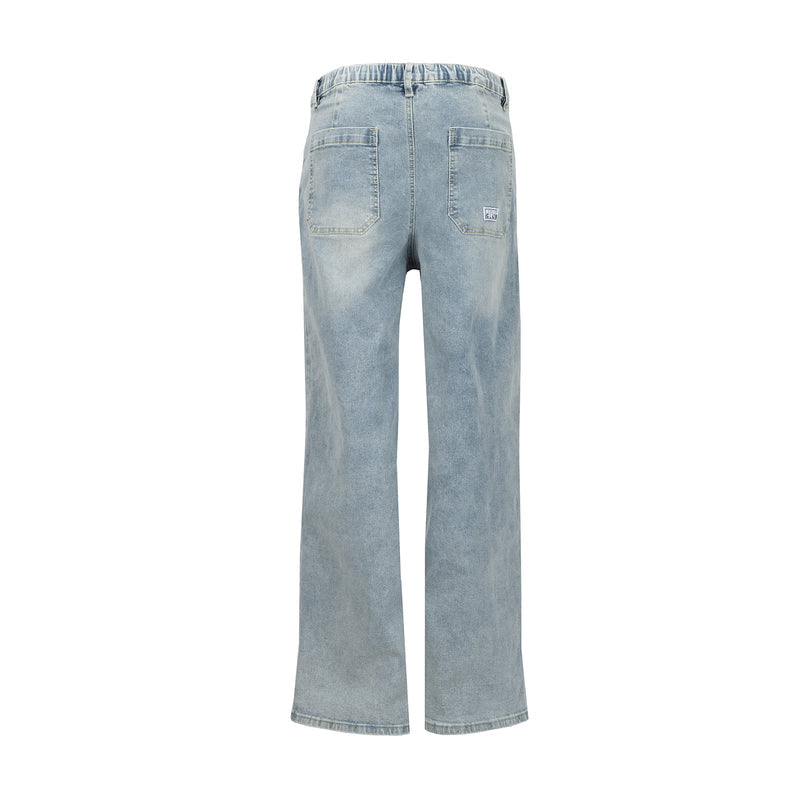High-rise light-wash denim pants, back view with yoke and back pockets
