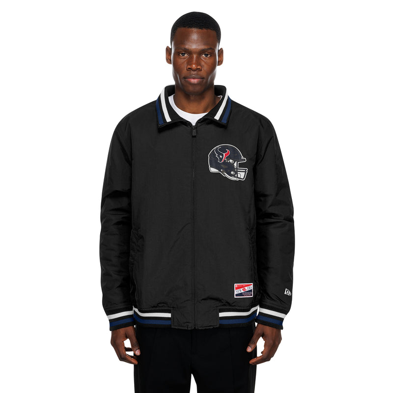 Zip-up black nylon track jacket with Texans logo, stand collar, striped ribbed cuffs