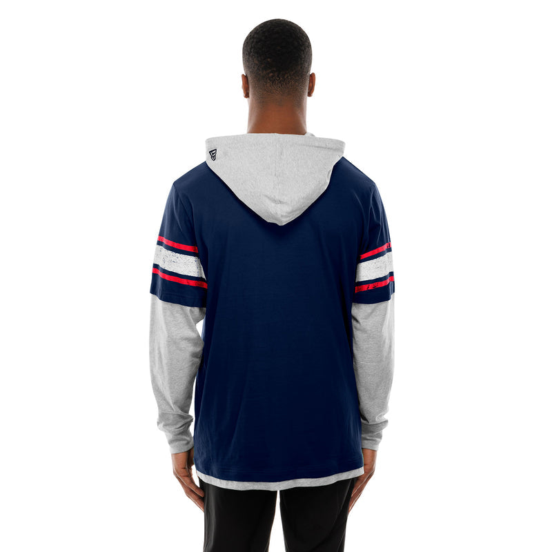 Navy hooded long-sleeve sweatshirt from back with gray hood lining and striped sleeve bands