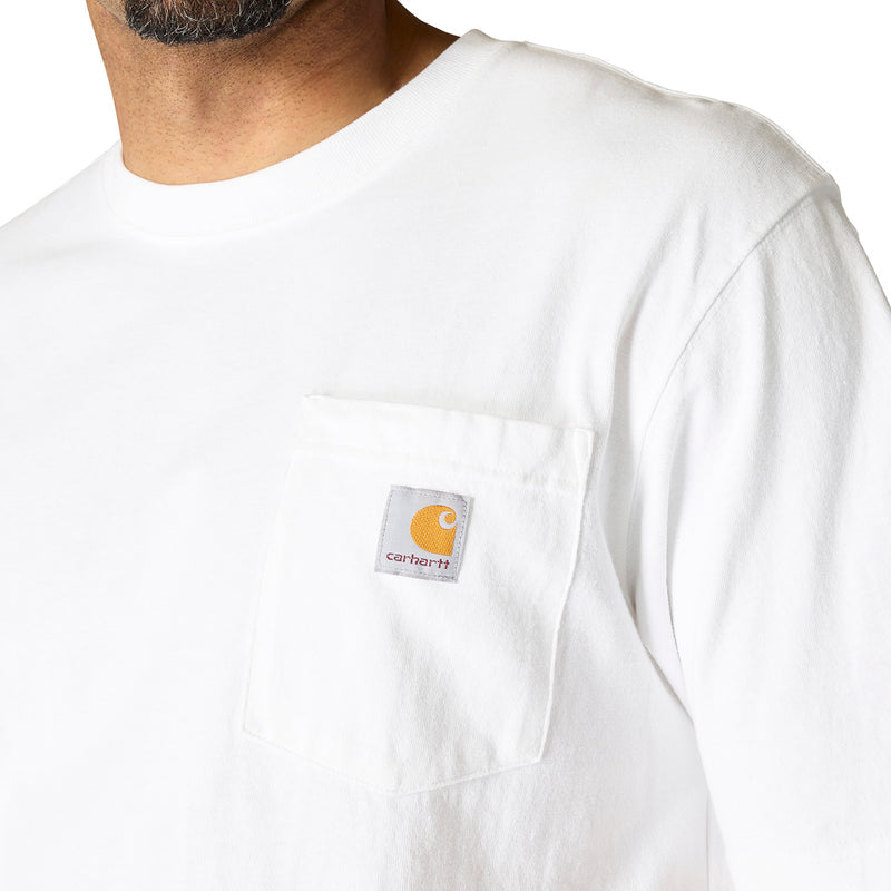 Close-up of white chest pocket on a men’s loose-fit tee with logo patch
