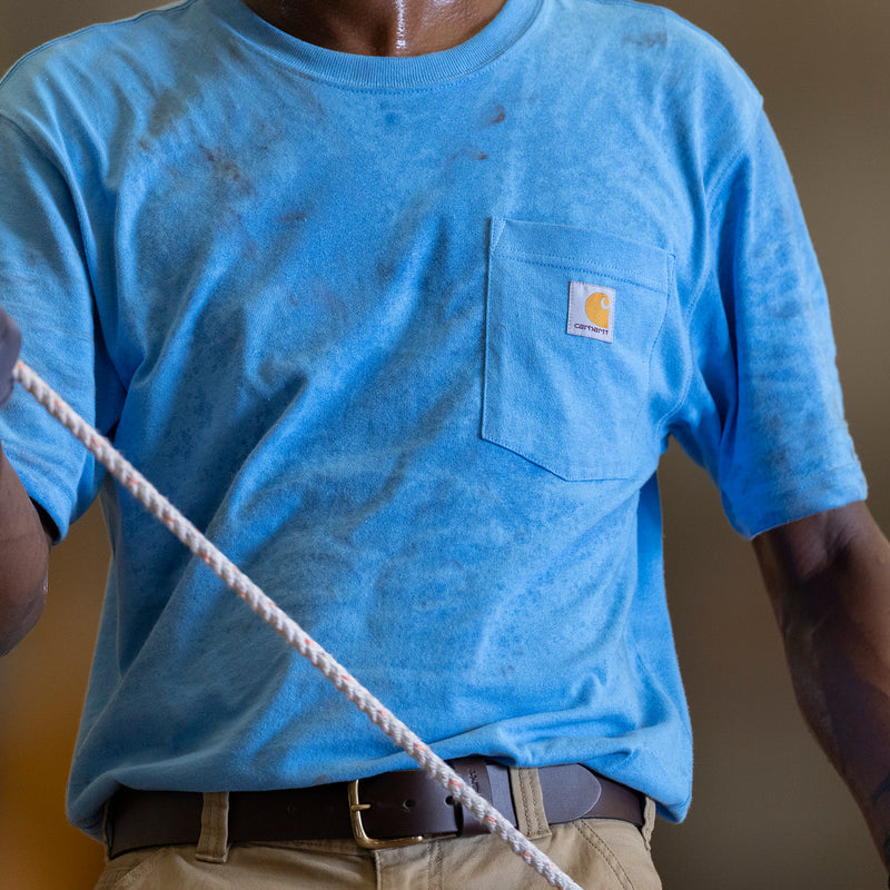 Close-up of horizon blue chest pocket T-shirt with front logo patch