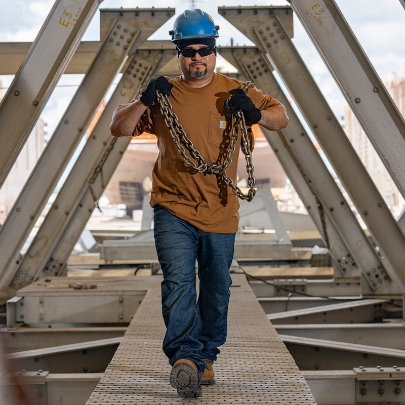 Men's Carhartt Brown loose-fit pocket tee worn outdoors by construction worker