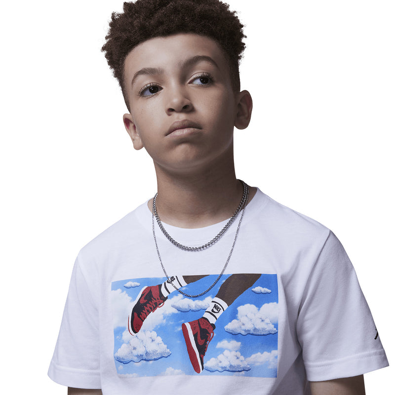 Youth white crew-neck T-shirt close-up with sneaker graphic on chest