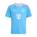Youth light-blue soccer jersey with pink collar trim, team crest, and anchor logo