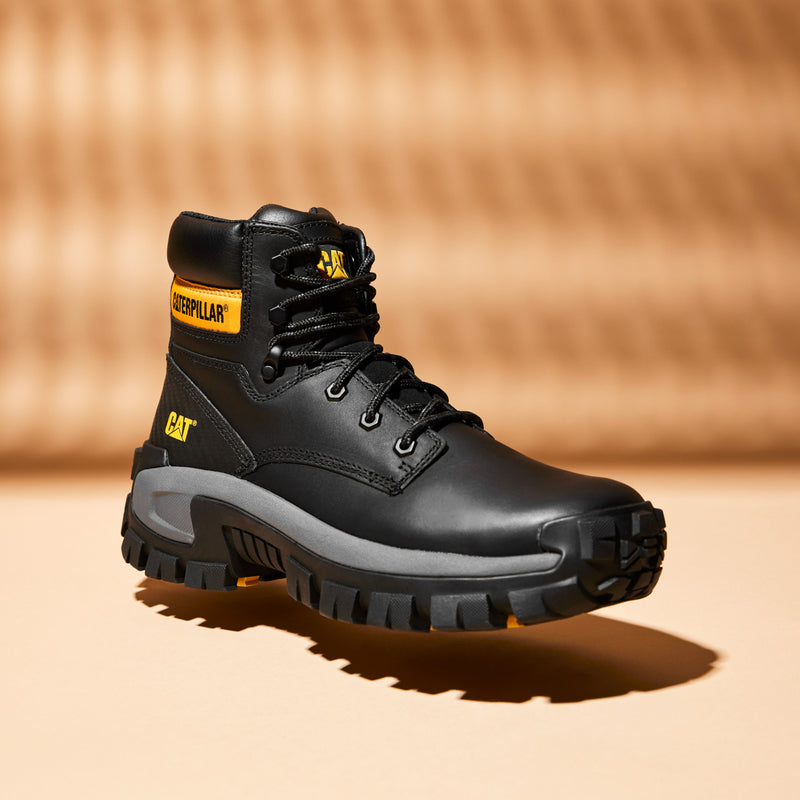 Men's black steel-toe work boot with yellow CAT accents and rugged tread sole