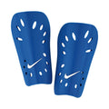 Royal blue shin guards with perforated design and Nike swoosh logo