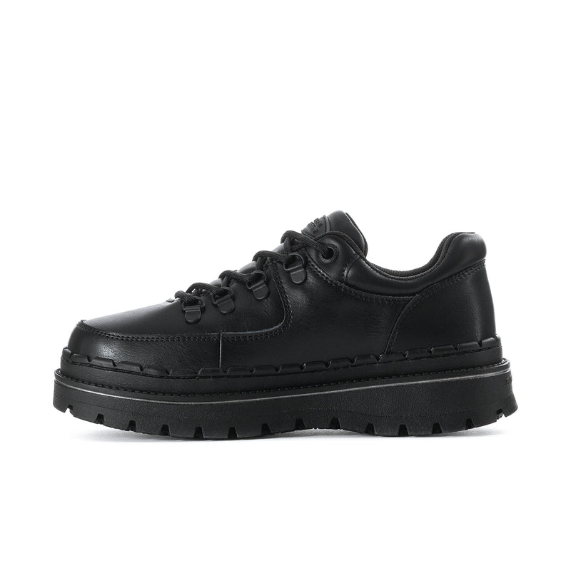 Women's black slip-resistant lace-up sneaker, angled side profile with lugs