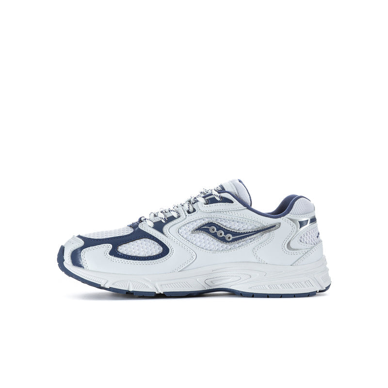Youth running shoe in white and navy, other side profile, lace-up design