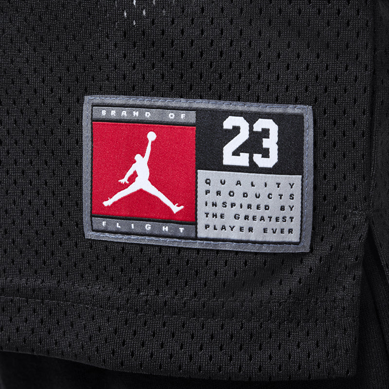 Black jersey with textured fabric and '23' brand quality label patch