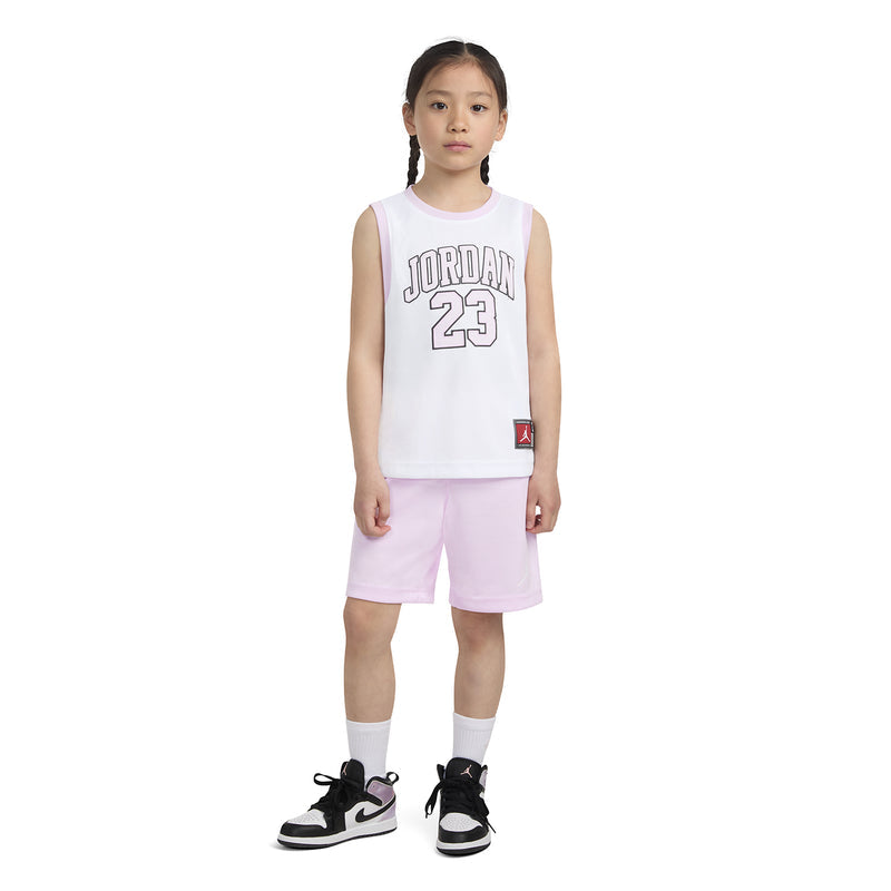 Kids white sleeveless jersey with Jordan 23 graphic and light pink shorts