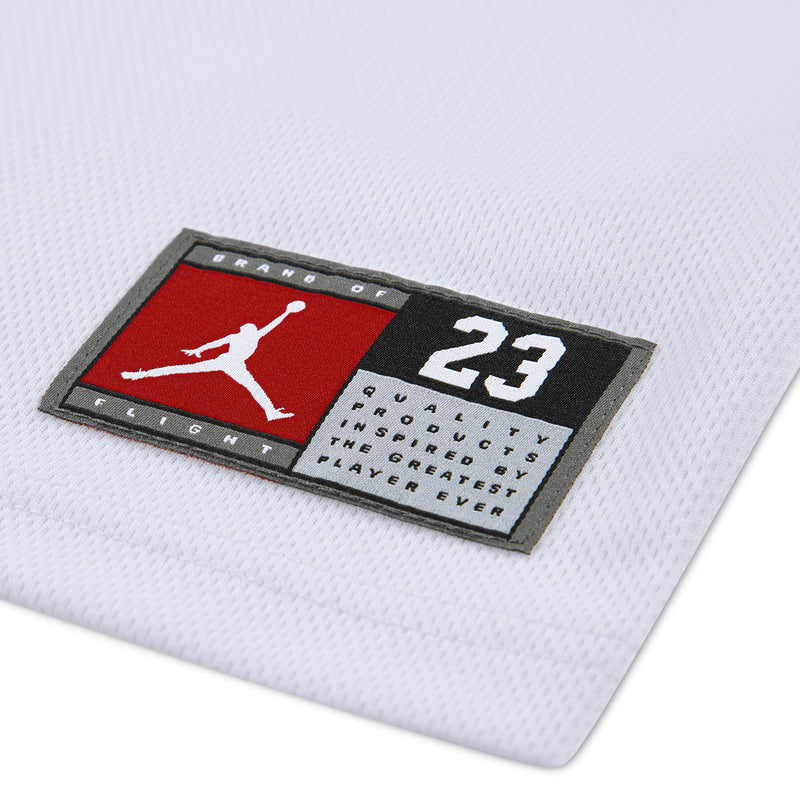 Jordan jersey label patch with Jumpman and '23' details on white fabric