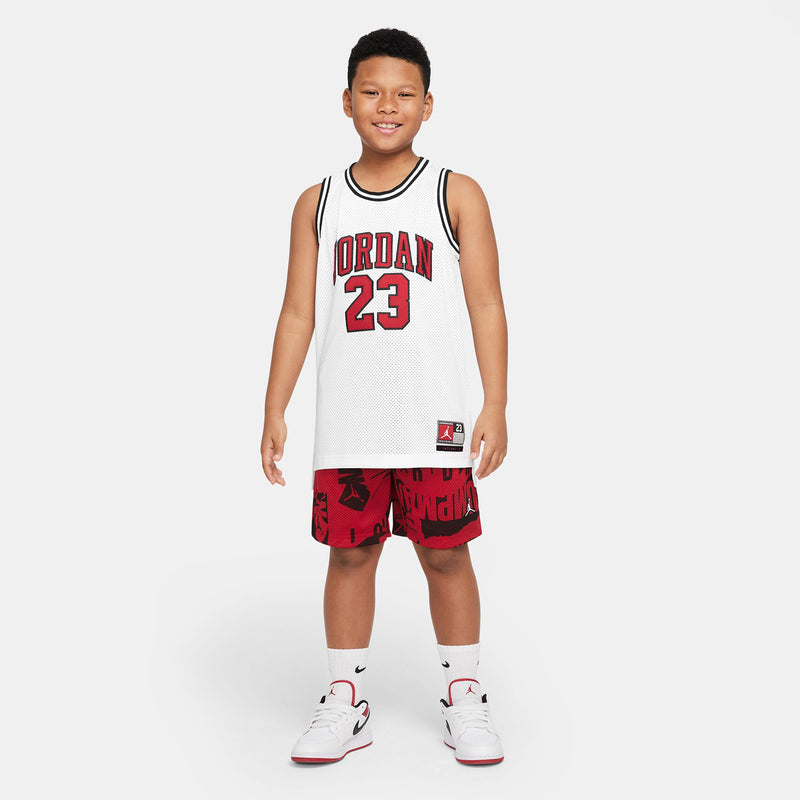 White youth basketball jersey with front 'JORDAN 23' number and black neck trim