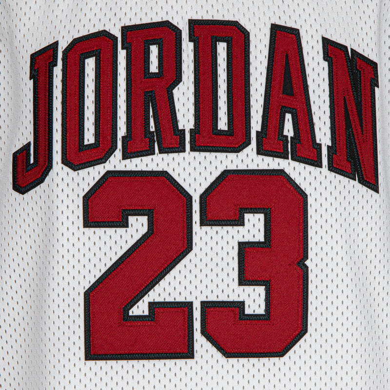 JORDAN 23 stitched graphic on a white youth basketball jersey