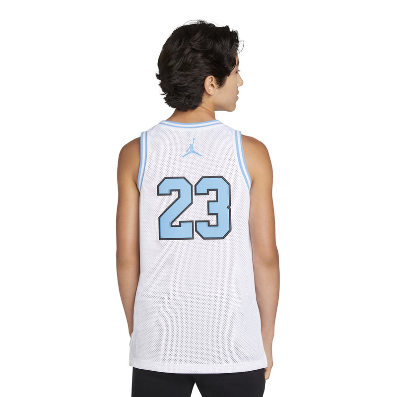 White youth basketball jersey back with Jordan 23 number and Jumpman logo, light blue trim