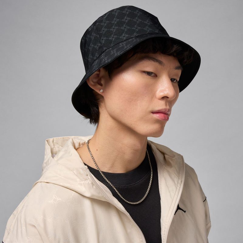 Black bucket hat with dark grey pattern and front Jordan Jumpman logo