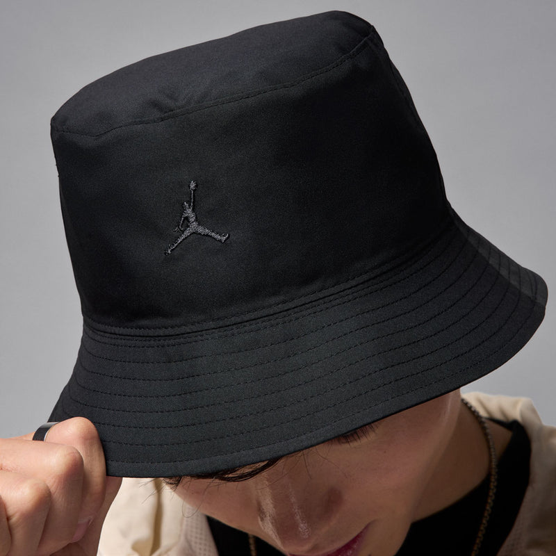 Black bucket hat with small Jordan Jumpman on crown and curved brim