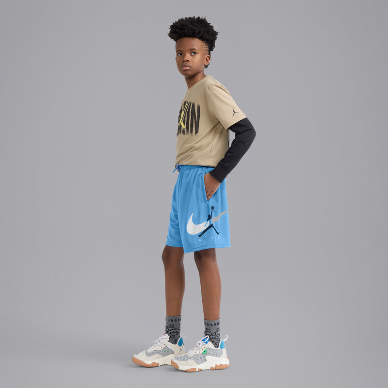 Youth blue mesh athletic shorts with elastic waist and drawstring, side Jordan logo