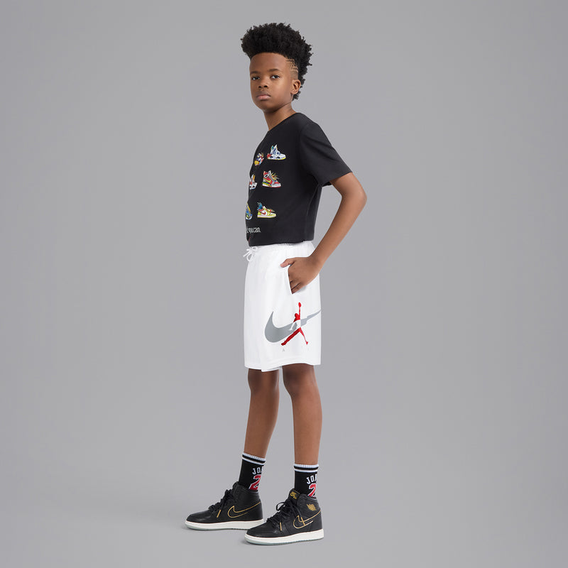 Youth white mesh shorts with elastic waist and large Swoosh with red jumpman on the side