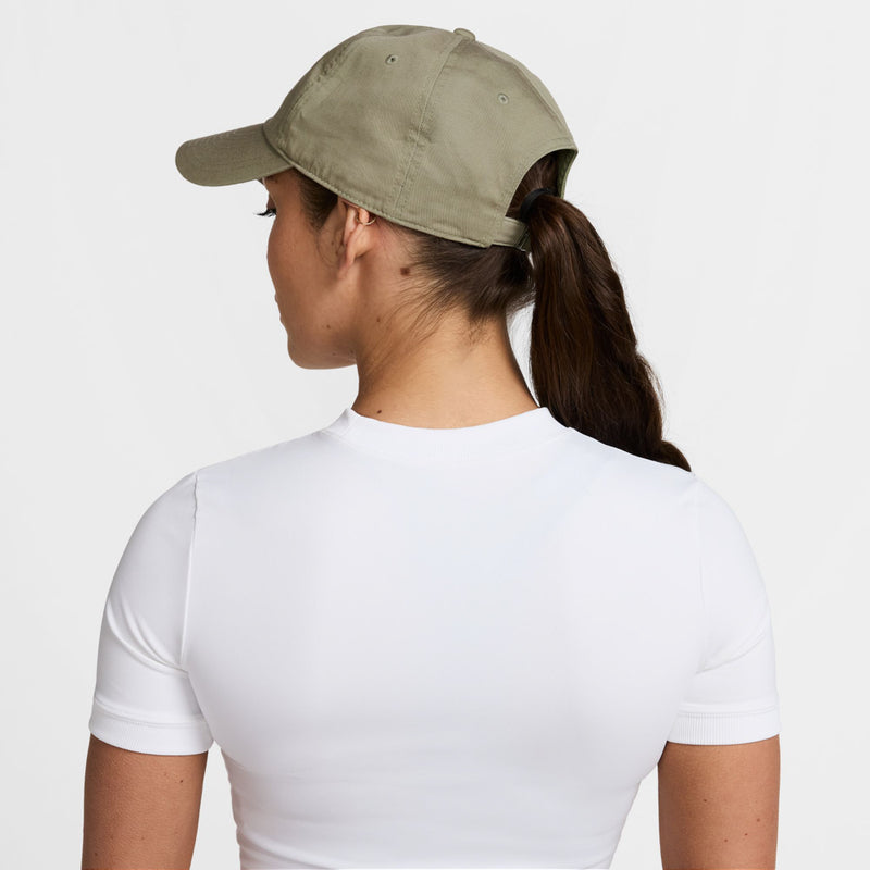 Washed khaki unstructured baseball cap with curved brim, back view.