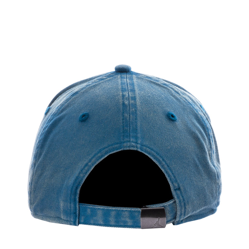 Faded blue strapback cap underside view with gray snapback strap