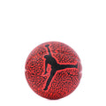 Mini basketball with red/black patterned cover and Jordan silhouette