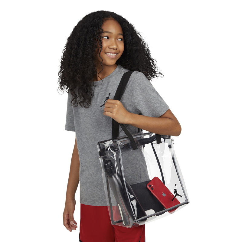 Jordan Stadium clear tote bag with black handles, showing red item inside