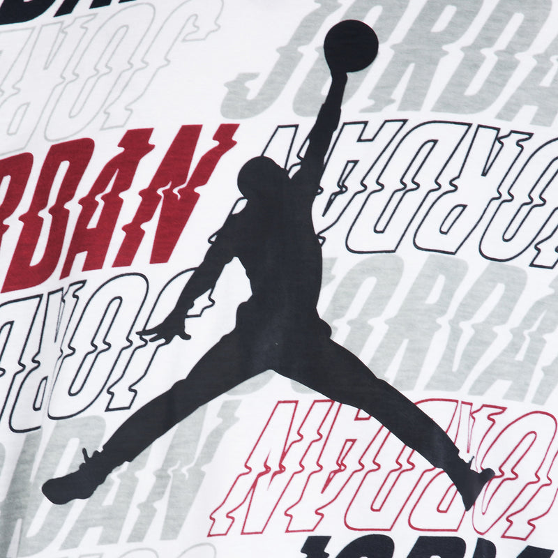 Youth tee close-up: black Jumpman silhouette over white-and-red graphic print