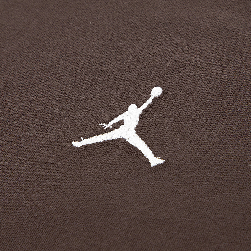 Brown youth tee close-up of white Jumpman embroidery on chest