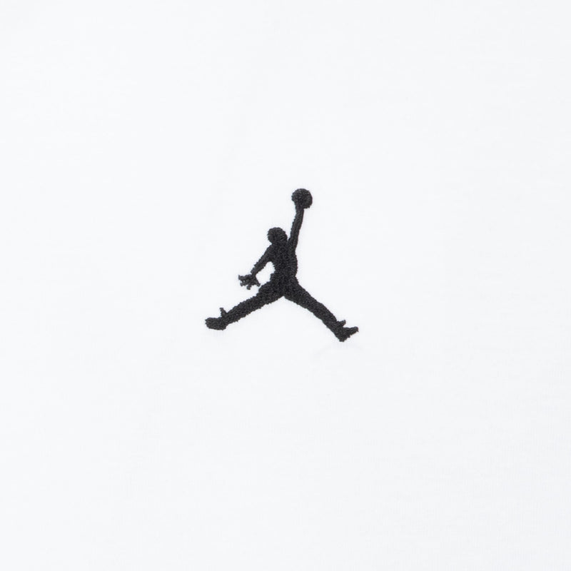 Youth white crewneck tee with large black Jumpman embroidery