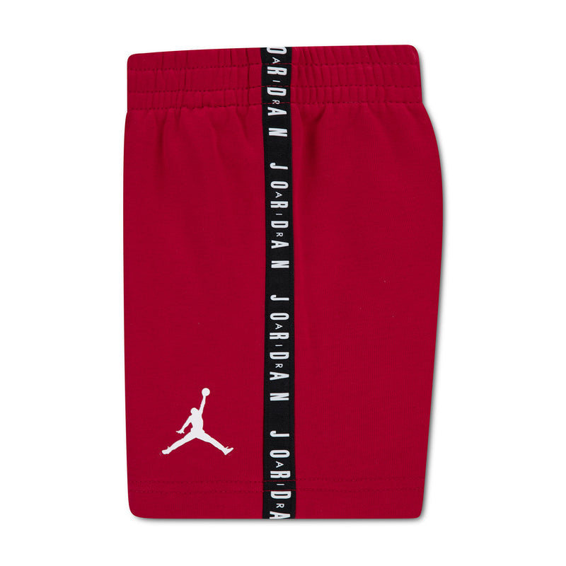 Gym Red toddler shorts with black side tape reading JORDAN and white Jumpman logo