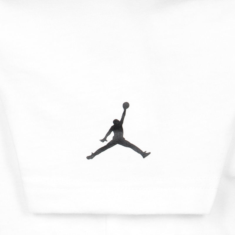 Youth white T-shirt with small centered Jumpman silhouette logo