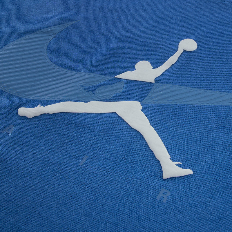 Youth blue T-shirt close-up: large Jumpman silhouette logo on chest